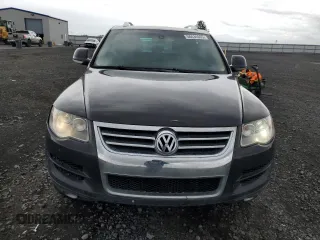 2008 Volkswagen Touareg V6 z VIN WVGBE77LX8D000610, wystawiony jako Copart lot #58434065 z przebiegiem 208 718 mil mil oraz Czysty tytuł • Clean title. Historia ofert i sprzedaży dostępna na DreamBid. Obrazek 5.