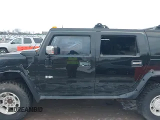 2003 Hummer H2 with VIN 5GRGN23UX3H106356, listed as a IAAI auction lot 41185603 with Not Provided miles. Bid and sale history available at carsss.com. Image 6.