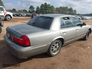 1998 Mercury Grand Marquis LS with VIN 2MEFM75W8WX687967, listed as a IAAI auction lot 41626058 with 135,183 mi miles. Bid and sale history available at carsss.com. Image 4.