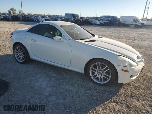 2007 Mercedes-Benz SLK-Class 3.0L with VIN WDBWK54F27F163187, listed as a Copart auction lot 80689934 with 183,188 mi miles and Salvage Title. Bid and sale history available at carsss.com. Image 4.