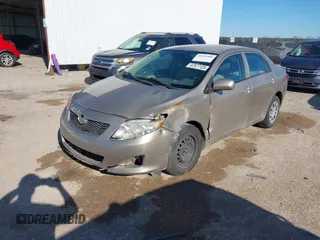 2009 Toyota Corolla with VIN 2T1BU40E59C163293, listed as a IAAI auction lot 41824986 with 123,954 mi miles. Bid and sale history available at carsss.com. Image 17.