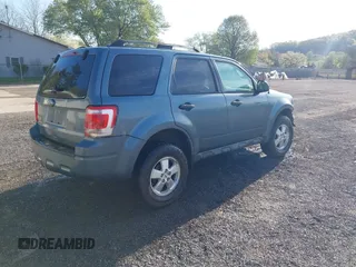 2012 Ford Escape XLT with VIN 1FMCU9D77CKB63827, listed as a IAAI auction lot 42044393 with 231,933 mi miles and . Bid and sale history available at DreamBid. Image 4.