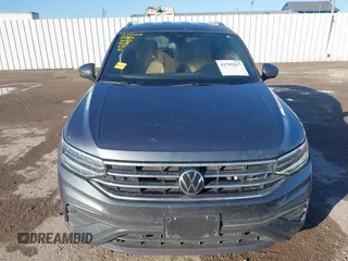 2022 Volkswagen Tiguan SE with VIN 3VV3B7AX1NM147445, listed as a IAAI auction lot 41755217 with 59,399 mi miles and . Bid and sale history available at DreamBid. Image 12.