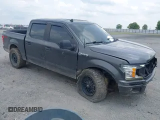 2020 Ford F-150 XL with VIN 1FTEW1E50LKE69077, listed as a IAAI auction lot 42411667 with 106,146 mi miles and . Bid and sale history available at DreamBid. Image 1.