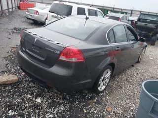 2009 Pontiac G8 with VIN 6G2ER577X9L185706, listed as a IAAI auction lot 41938748 with 150,648 mi miles. Bid and sale history available at carsss.com. Image 4.