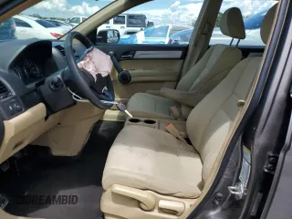 2010 Honda CR-V LX with VIN 5J6RE4H34AL057648, listed as a Copart auction lot 62679515 with 103,047 mi miles and Salvage title. Bid and sale history available at DreamBid. Image 7.