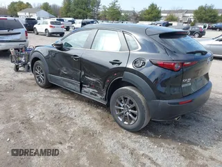 2021 Mazda CX-30 S with VIN 3MVDMBAL5MM214185, listed as a IAAI auction lot 41800888 with 33,267 mi miles and . Bid and sale history available at carsss.com. Image 3.