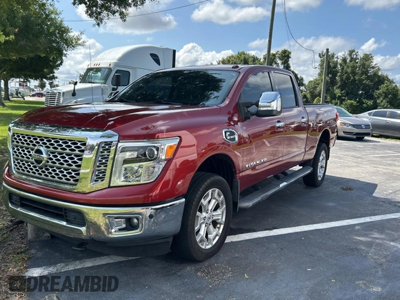 2016 Nissan Titan SL z VIN 1N6BA1F26GN512666, wystawiony jako Copart lot #59731495 z przebiegiem 120 182 mil mil oraz Czysty tytuł • Clean title. Historia ofert i sprzedaży dostępna na DreamBid. Obrazek 2.