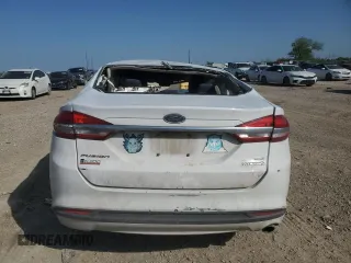 2017 Ford Fusion Hybrid SE с VIN 3FA6P0LU8HR356816, выставлен на аукционе Copart как лот 51005915 с пробегом Не указан миль и Списание • Salvage title. История ставок и продаж доступна на DreamBid. Изображение 6.