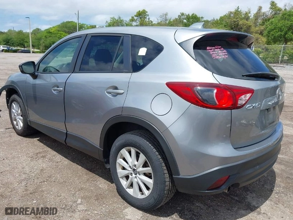 2014 Mazda CX-5 Touring with VIN JM3KE2CY4E0357445, listed as a IAAI auction lot 41967334 with 115,535 mi miles. Bid and sale history available at carsss.com. Image 3.