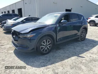 2018 Mazda CX-5 Grand Touring с VIN JM3KFADM1J1387297, выставлен на аукционе Copart как лот 60589625 с пробегом 92 283 миль миль и На запчасти • Non repairable. История ставок и продаж доступна на DreamBid. Изображение 1.