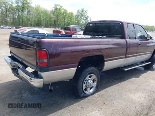 2002 Dodge 2500 z VIN 3B7KF23C92M244271, wystawiony jako IAAI lot #42104621 z przebiegiem 179 986 mil mil oraz . Historia ofert i sprzedaży dostępna na DreamBid. Obrazek 4.