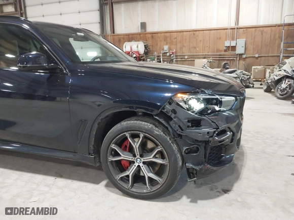 2022 BMW X5 xDrive40i with VIN 5UXCR6C00N9M47589, listed as a IAAI auction lot 41790432 with 36,059 mi miles. Bid and sale history available at carsss.com. Image 6.