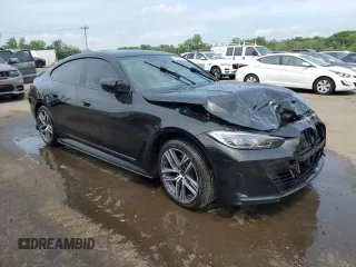 2024 BMW 4 Series 430i xDrive z VIN WBA73AV05RFP73980, wystawiony jako Copart lot #57059745 z przebiegiem 29 170 mil mil oraz Szkoda całkowita • Salvage title. Historia ofert i sprzedaży dostępna na DreamBid. Obrazek 4.