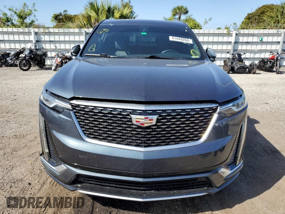 2021 Cadillac XT6 Luxury z VIN 1GYKPAR49MZ212522, wystawiony jako Copart lot #41449264 z przebiegiem 45 935 mil mil oraz . Historia ofert i sprzedaży dostępna na DreamBid. Obrazek 5.