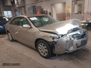2009 Toyota Camry Hybrid with VIN JTNBB46K793052834, listed as a IAAI auction lot 41795017 with 243,223 mi miles. Bid and sale history available at carsss.com. Image 1.