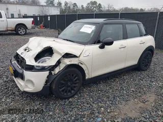 2016 MINI Cooper Hardtop 4 Door S with VIN WMWXU3C52G2D30121, listed as a IAAI auction lot 41521841 with 82,334 mi miles. Bid and sale history available at carsss.com. Image 18.
