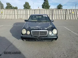 1997 Mercedes-Benz E-Class with VIN WDBJF72F8VA204316, listed as a Copart auction lot 84684614 with 203,748 mi miles and Salvage Title. Bid and sale history available at carsss.com. Image 11.