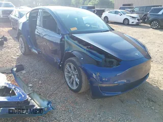2023 Tesla Model Y Long Range with VIN 7SAYGDEE3PA114256, listed as a IAAI auction lot 42158307 with 19,975 mi miles and . Bid and sale history available at DreamBid. Image 1.