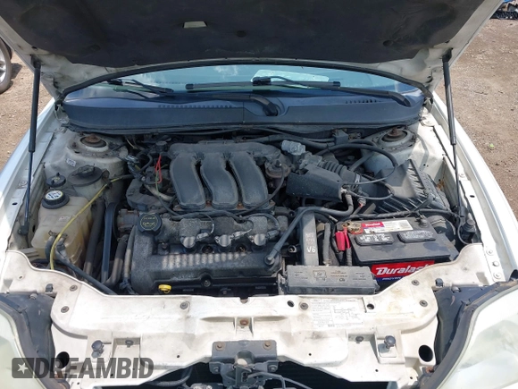 2005 Mercury Sable LS z VIN 1MEFM55S25A621939, wystawiony jako IAAI lot #42607222 z przebiegiem 237 492 mil mil oraz . Historia ofert i sprzedaży dostępna na DreamBid. Obrazek 10.