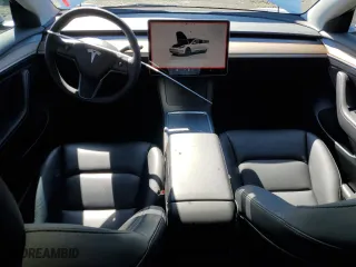 2023 Tesla Model 3 with VIN 5YJ3E1EA3PF610069, listed as a Copart auction lot 50327635 with 19,495 mi miles and Salvage Title. Bid and sale history available at carsss.com. Image 8.