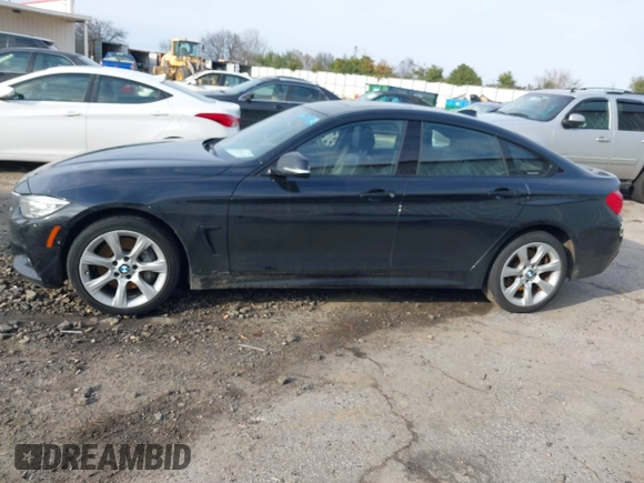 2016 BMW 4 Series 428i xDrive with VIN WBA4C9C52GG136584, listed as a IAAI auction lot 41530110 with 124,667 mi miles and . Bid and sale history available at carsss.com. Image 14.
