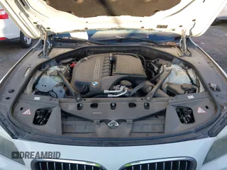 2013 BMW 7 Series 740i with VIN WBAYA6C54DD143796, listed as a IAAI auction lot 41433835 with 1 mi miles. Bid and sale history available at carsss.com. Image 10.