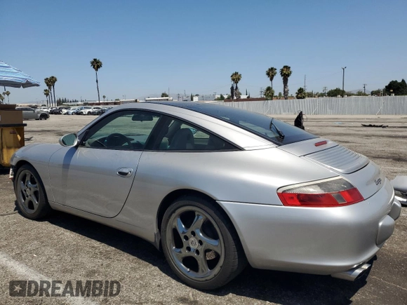 2003 Porsche 911 with VIN WP0BA29923S635457, listed as a Copart auction lot 61446545 with 85,602 mi miles and Salvage title. Bid and sale history available at DreamBid. Image 2.