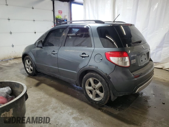 2009 Suzuki SX4 Man AWD with VIN JS2YB413496201977, listed as a Copart auction lot 84171644 with 136,908 mi miles and Salvage Title. Bid and sale history available at carsss.com. Image 2.