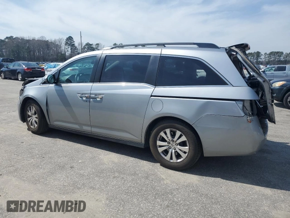 2016 Honda Odyssey SE with VIN 5FNRL5H36GB144433, listed as a Copart auction lot 48898755 with 192,442 mi miles and Salvage Title. Bid and sale history available at DreamBid. Image 2.