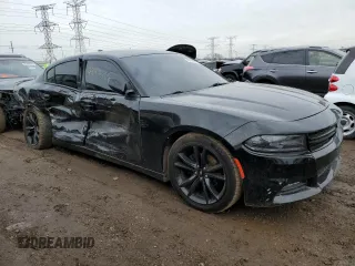 2017 Dodge Charger SXT with VIN 2C3CDXHG6HH606426, listed as a Copart auction lot 52100185 with 122,910 mi miles and Salvage Title. Bid and sale history available at DreamBid. Image 4.