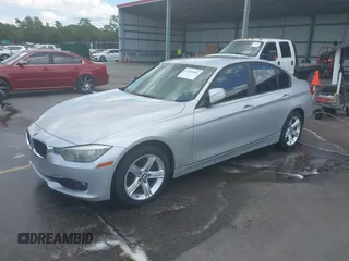 2014 BMW 3 Series 328i with VIN WBA3A5C50EP602200, listed as a IAAI auction lot 42555946 with 93,576 mi miles and . Bid and sale history available at DreamBid. Image 2.