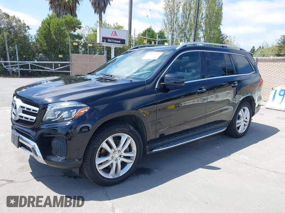 2017 Mercedes-Benz GLS 450 with VIN 4JGDF6EE9HA873951, listed as a IAAI auction lot 42053519 with 96,840 mi miles and . Bid and sale history available at DreamBid. Image 2.