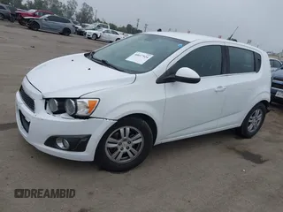 2012 Chevrolet Sonic LT with VIN 1G1JC6SH3C4143595, listed as a IAAI auction lot 40617924 with 156,246 mi miles and . Bid and sale history available at DreamBid. Image 2.