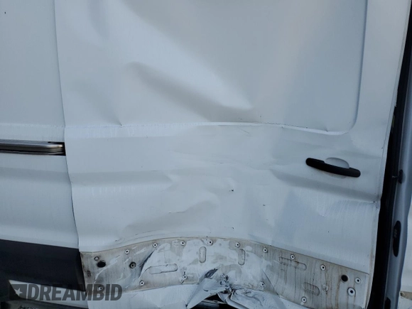 2020 Ford Transit Cargo with VIN 1FTBF4XG3LKB70573, listed as a Copart auction lot 77039474 with 131,873 mi miles and Salvage Title. Bid and sale history available at DreamBid. Image 11.