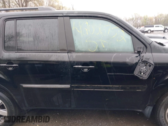 2014 Honda Pilot Touring with VIN 5FNYF4H91EB055741, listed as a IAAI auction lot 42006752 with 222,308 mi miles and . Bid and sale history available at carsss.com. Image 14.