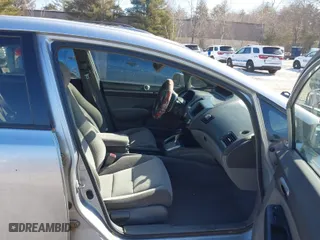 2006 Honda Civic Sdn EX with VIN 2HGFA16826H528610, listed as a IAAI auction lot 41694802 with 227,763 mi miles. Bid and sale history available at carsss.com. Image 5.