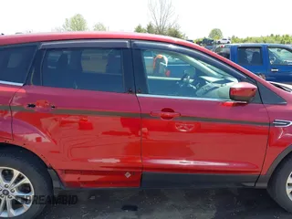 2017 Ford Escape SE with VIN 1FMCU9GD6HUE90149, listed as a IAAI auction lot 42092316 with 162,977 mi miles and . Bid and sale history available at DreamBid. Image 14.