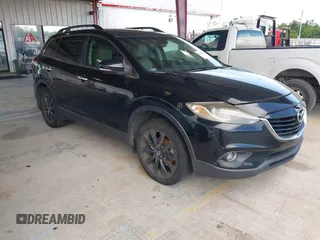 2014 Mazda CX-9 Grand Touring z VIN JM3TB2DA3E0439407, wystawiony jako IAAI lot #42332095 z przebiegiem 108 333 mil mil oraz . Historia ofert i sprzedaży dostępna na DreamBid. Obrazek 1.