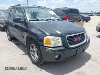 2005 GMC Envoy SLE z VIN 1GKDS13SX52373187, wystawiony jako IAAI lot #42434190 z przebiegiem 112 965 mil mil oraz . Historia ofert i sprzedaży dostępna na DreamBid. Obrazek 1.