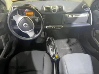2012 Smart fortwo Pure z VIN WMEEJ3BA5CK540092, wystawiony jako Copart lot #57123825 z przebiegiem 59 356 mil mil oraz Szkody całkowita. Historia ofert i sprzedaży dostępna na DreamBid. Obrazek 9.