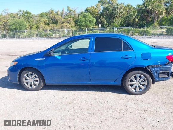 2009 Toyota Corolla with VIN JTDBL40E999021523, listed as a IAAI auction lot 42019856 with 194,011 mi miles. Bid and sale history available at carsss.com. Image 15.