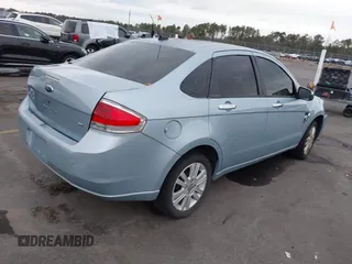 2008 Ford Focus SE with VIN 1FAHP35N78W270569, listed as a IAAI auction lot 38518647 with 173,674 mi miles. Bid and sale history available at carsss.com. Image 4.