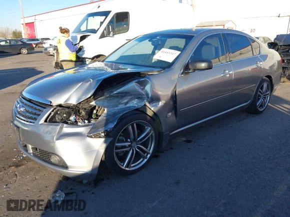 2006 Infiniti M z VIN JNKAY01E56M107083, wystawiony jako IAAI lot #41443347 z przebiegiem 162 191 mil mil oraz . Historia ofert i sprzedaży dostępna na DreamBid. Obrazek 17.