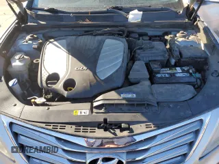 2014 Hyundai Azera Limited z VIN KMHFH4JG3EA360317, wystawiony jako Copart lot #79748564 z przebiegiem Nie podano mil oraz Szkoda całkowita • Salvage title. Historia ofert i sprzedaży dostępna na DreamBid. Obrazek 12.