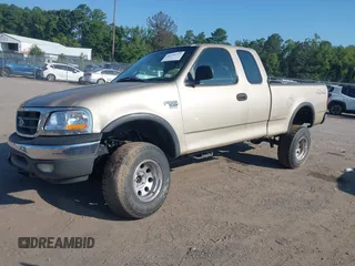 2000 Ford F-150 XL z VIN 1FTRX18W7YNA73804, wystawiony jako IAAI lot #42779753 z przebiegiem 228 666 mil mil oraz . Historia ofert i sprzedaży dostępna na DreamBid. Obrazek 2.