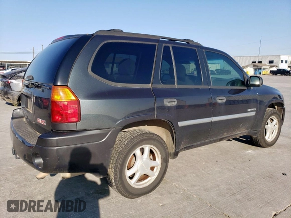 2006 GMC Envoy SLT with VIN 1GKDS13S962287726, listed as a Copart auction lot 48945535 with 126,207 mi miles and Salvage Title. Bid and sale history available at carsss.com. Image 3.