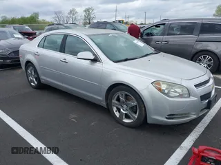 2012 Chevrolet Malibu 1LT with VIN 1G1ZC5E00CF229048, listed as a IAAI auction lot 41949098 with 158,252 mi miles and . Bid and sale history available at DreamBid. Image 1.