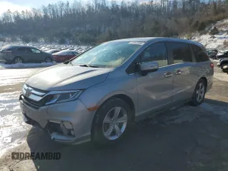 2019 Honda Odyssey EX with VIN 5FNRL6H59KB074264, listed as a Copart auction lot 87653495 with 104,422 mi miles and Salvage Title. Bid and sale history available at carsss.com. Image 1.