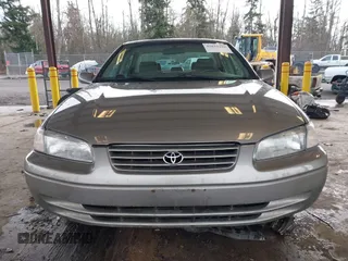 1998 Toyota Camry LE z VIN JT2BF28K1W0109514, wystawiony jako IAAI lot #41610102 z przebiegiem 161 266 mil mil oraz . Historia ofert i sprzedaży dostępna na DreamBid. Obrazek 12.